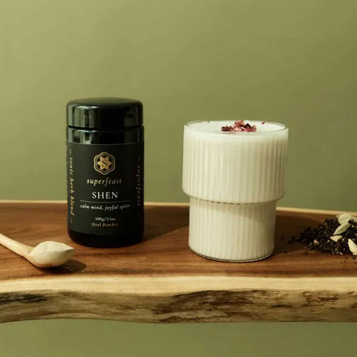 Superfeast SHEN Bottle Front with Glass of Drink